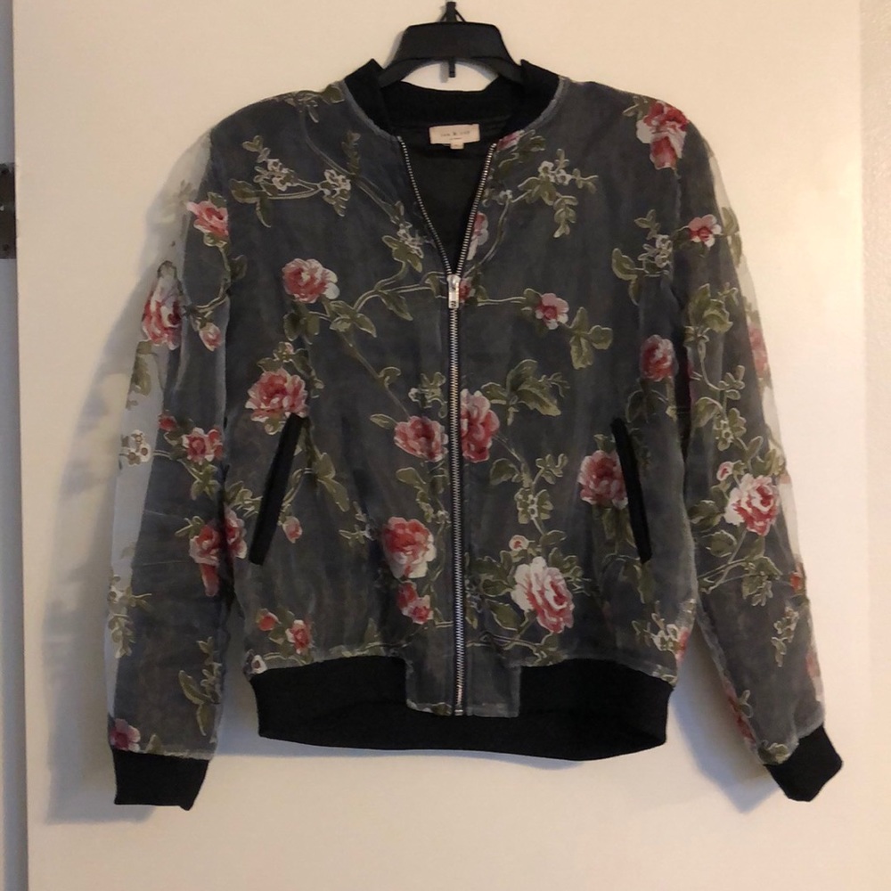 Bomber jacket. Has a unique design and texture.